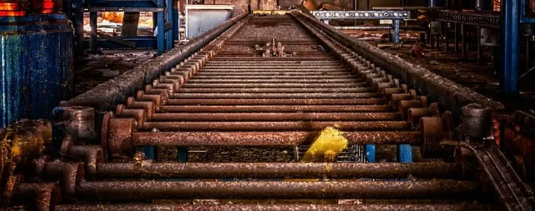 Industrial conveyor line running through a plant