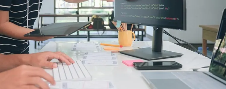 Designers reviewing a site layout on screen