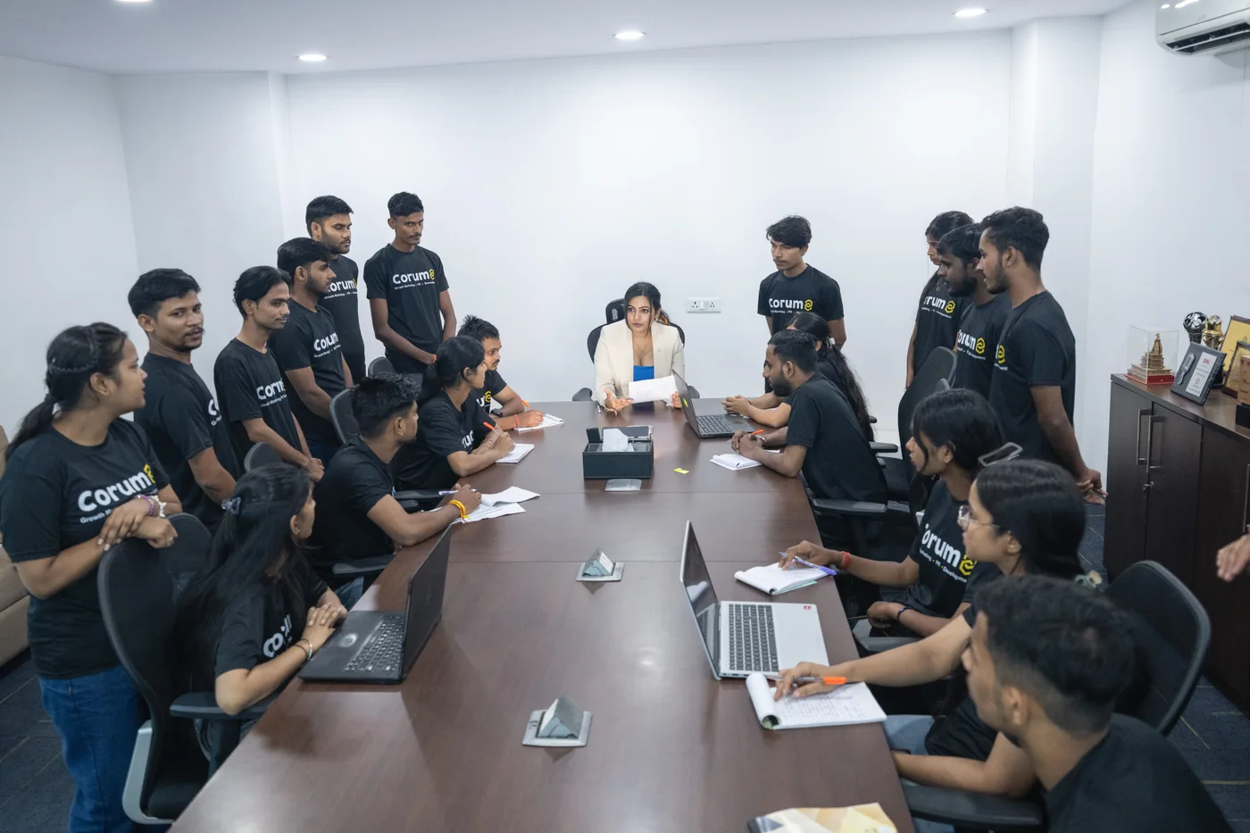 Corum8 team discussing strategy